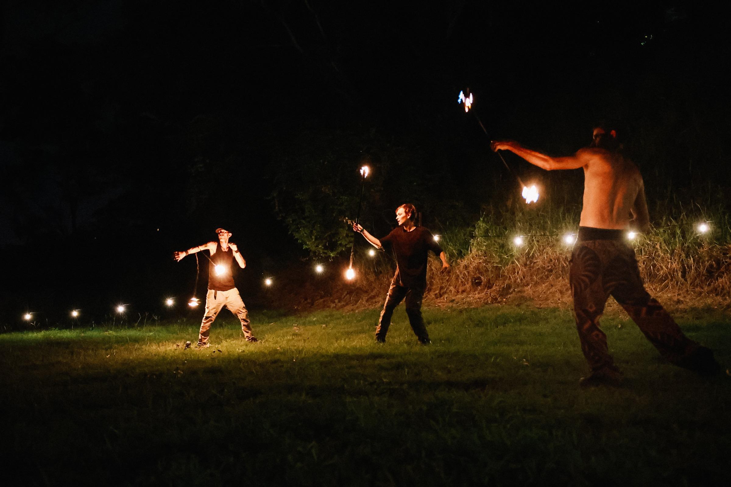 Campfire gathering at night